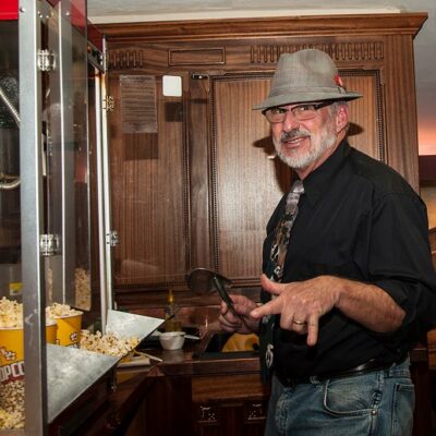 Volunteer serving Popcorn